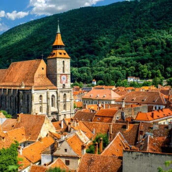 Brasov cityscape with black cathedral and mountain on backround in Romania shutterstock 294937313 - About Brașov